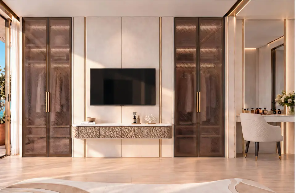 Studio with bronze-framed glass wardrobes and a dressing table
